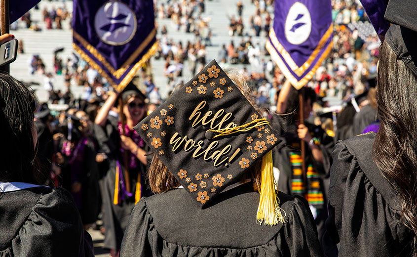 graduation cap with words 'hello world'
