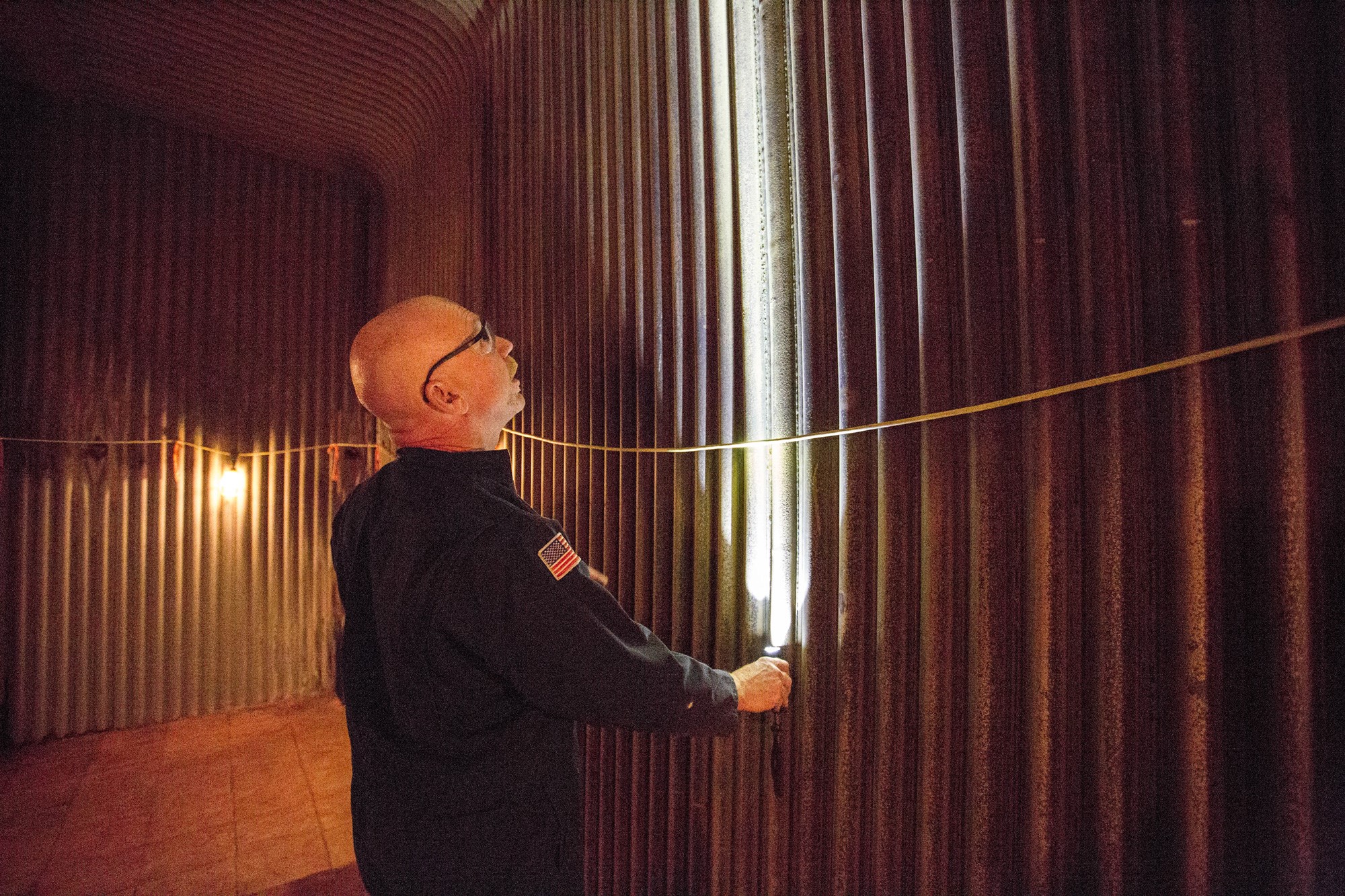 Alan Horne inspects the tube that compose of the boiler's inner walls