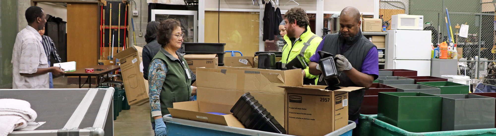 UW staff members collaborate during a MiniMax installation in the Meany Center for Performing Arts.