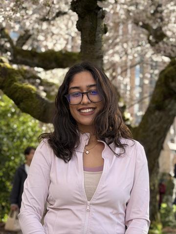 Avantika Sharma on UW Quad during cherry blossom season