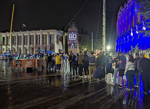 people in line on Red Square at night