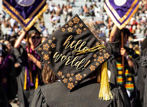 graduation cap with words 'hello world'