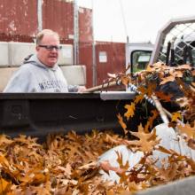 Mike Erickson starts to rake out a batch of leaves