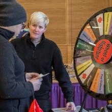 Emergency Management’s Siri McLean teaches about preparedness using the Wheel of Misfortune.