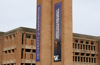 a pair of banners hung on the bell towers in red square