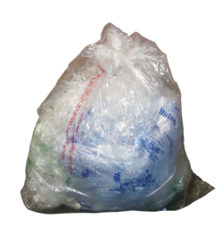 Plastic film in a clear bag tied shut with a knot.