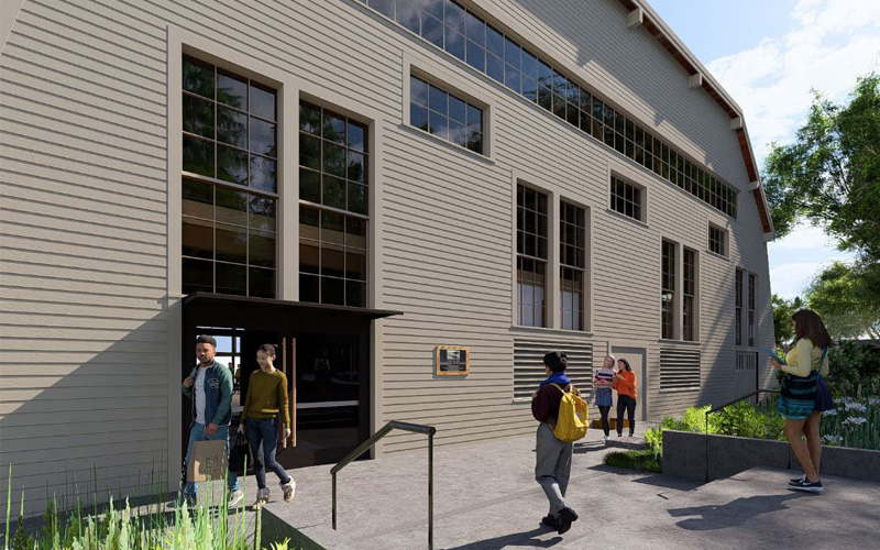 rendering of the exterior of the asuw shell house from a southern view showing large double doors with people walking by and in