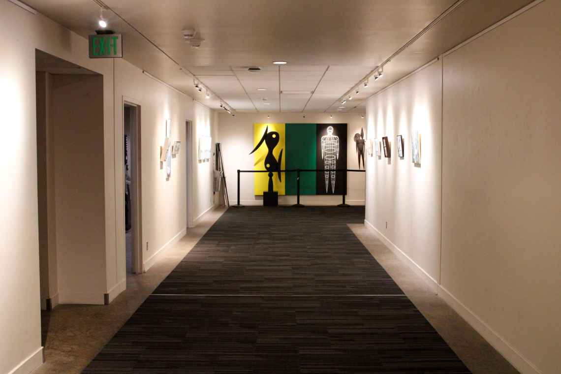 Mezzanine hallway with illuminated art