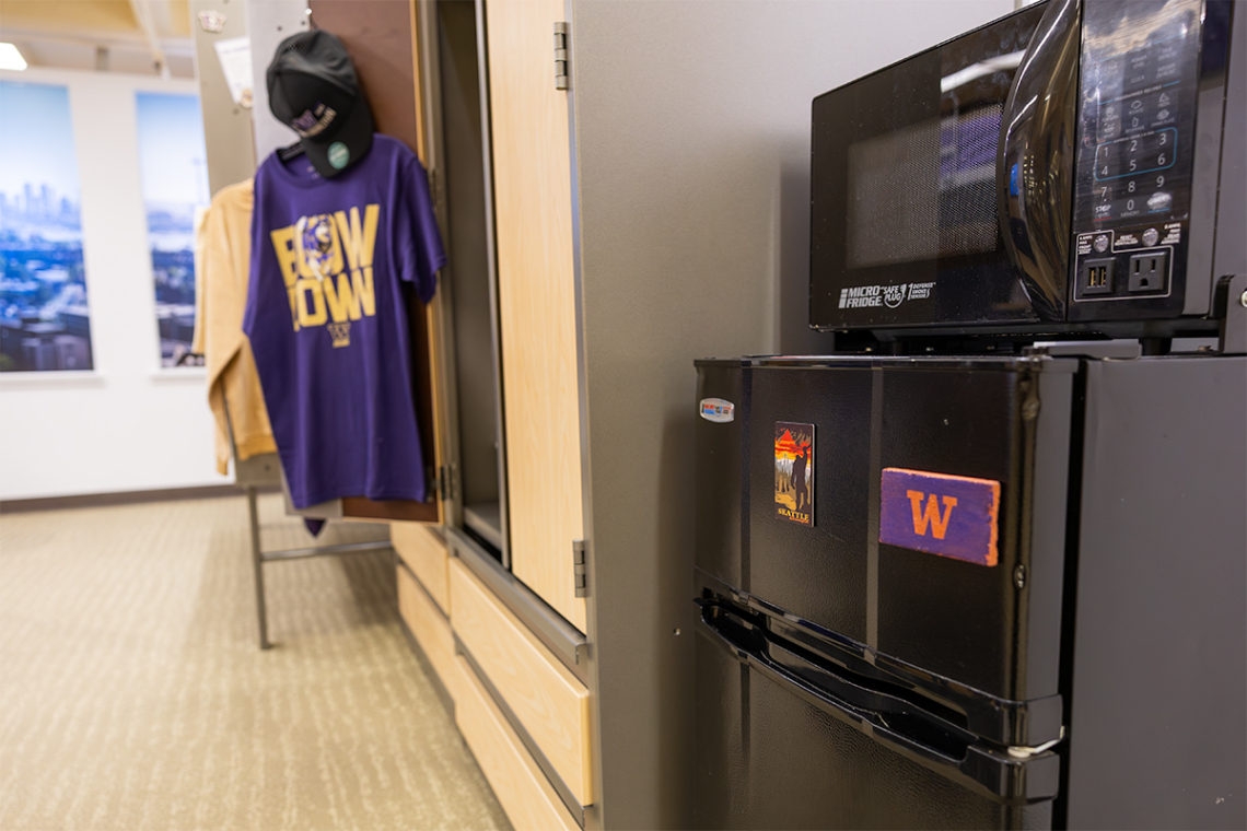 a microwave and minifridge unit in a residence hall