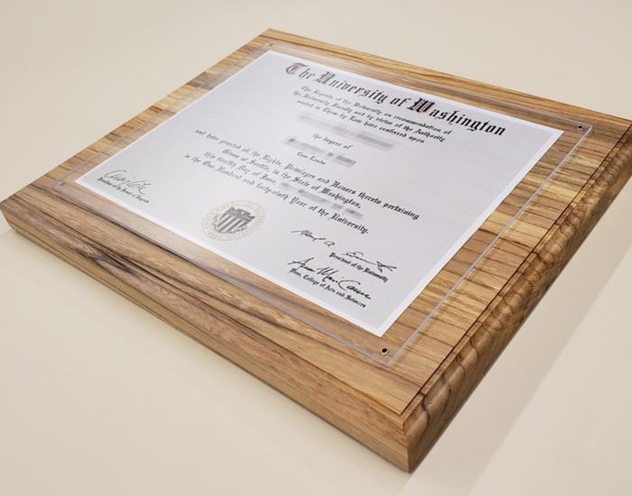 wood diploma holder with UW diploma displayed