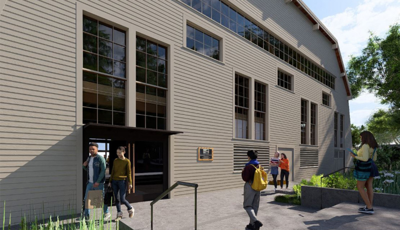 rendering of the exterior of the asuw shell house from a southern view showing large double doors with people walking by and in