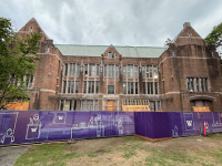 anderson hall exterior elevation with construction fence around building