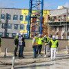 people standing in a construction site