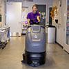 man on a riding vacuum