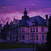 Denny Hall bathed in a purple light