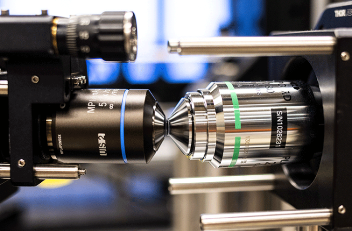 a pair of high-magnification microscope objective lenses