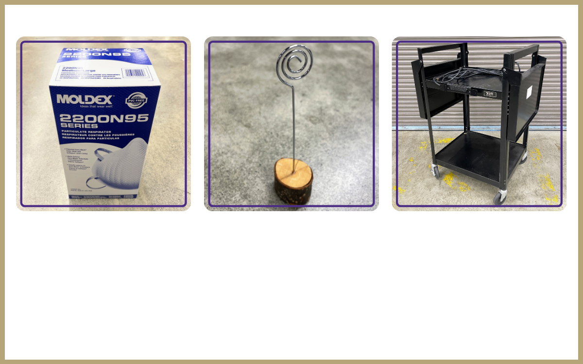 box of N95 masks, photo holder clip with wood base, black AV cart with flip-up sides