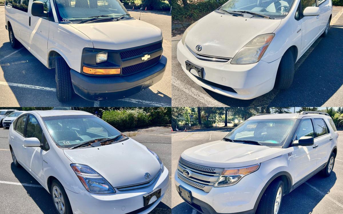 A stitched image fo four white passenger vehicles.