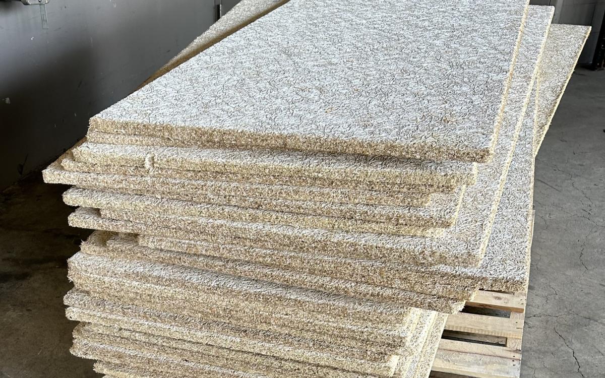 Woven architectural panels on a pallet.