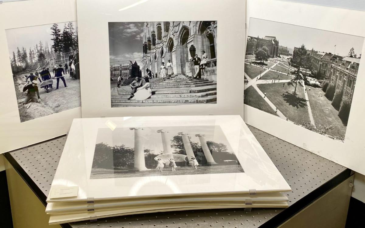 Group of black and white photos, printed and matted.