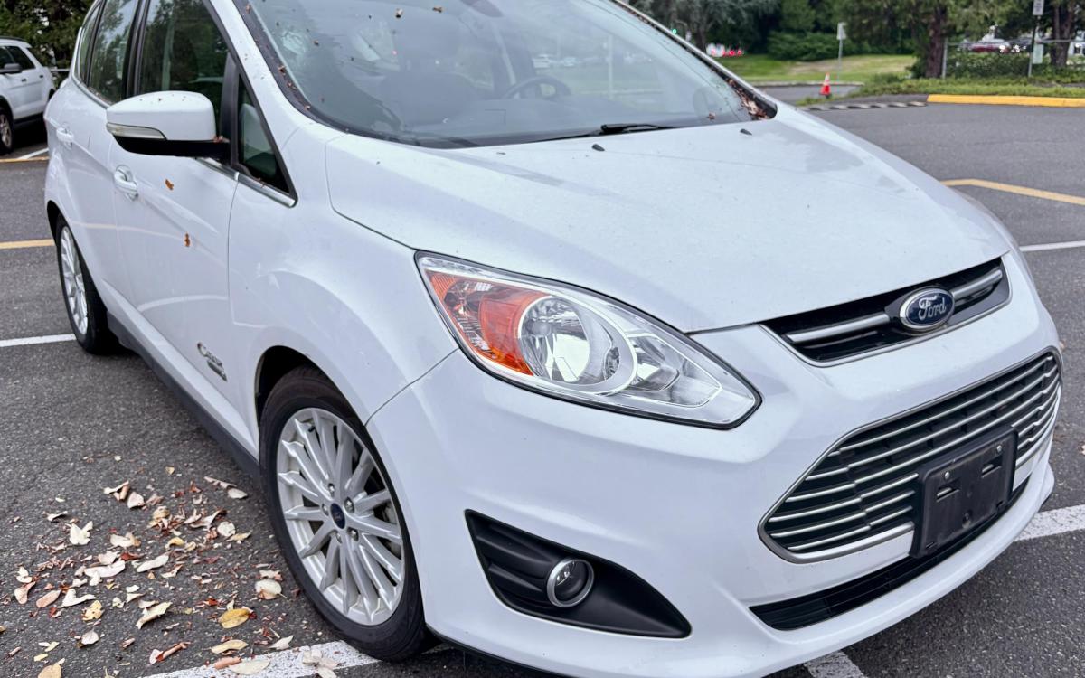 White 2012 Ford C-Max as viewed from the front corner.