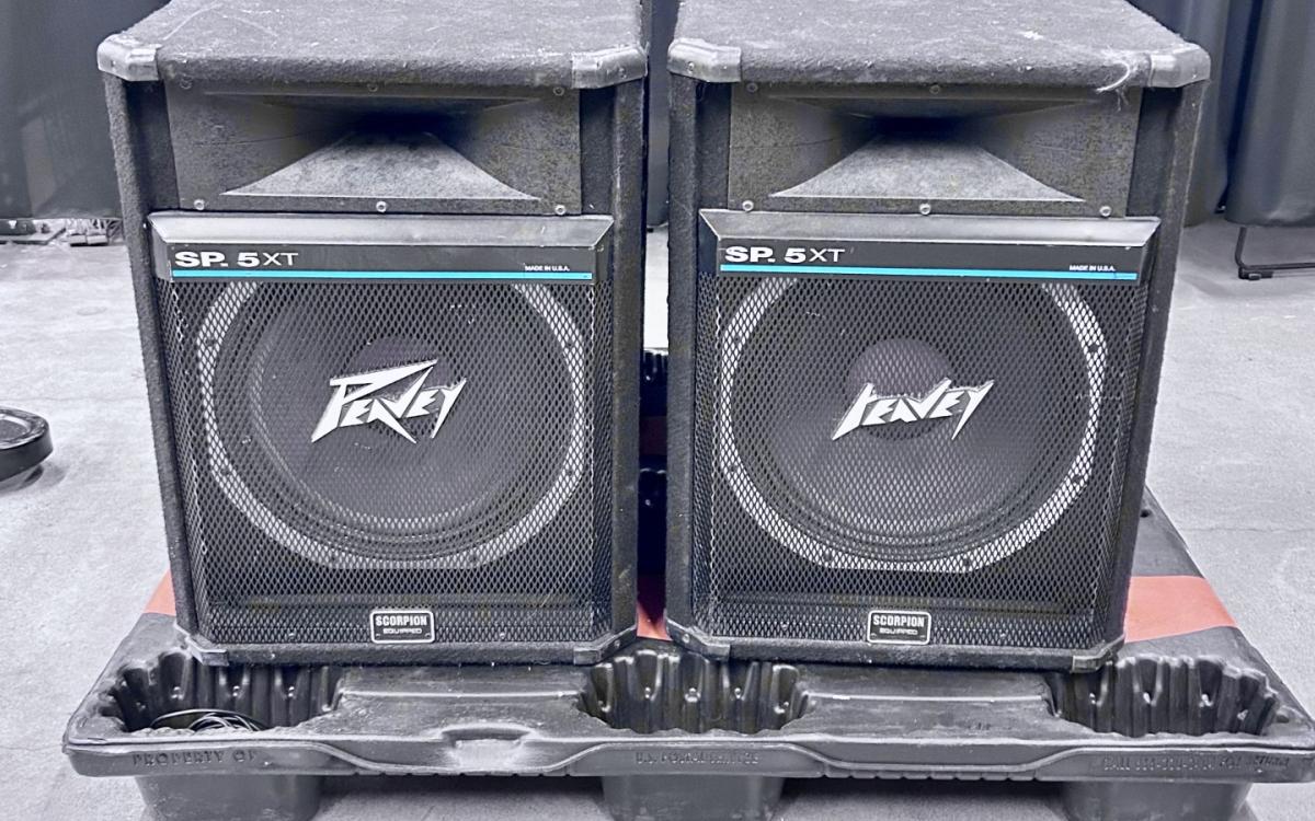 Peavey speakers on a pallet.