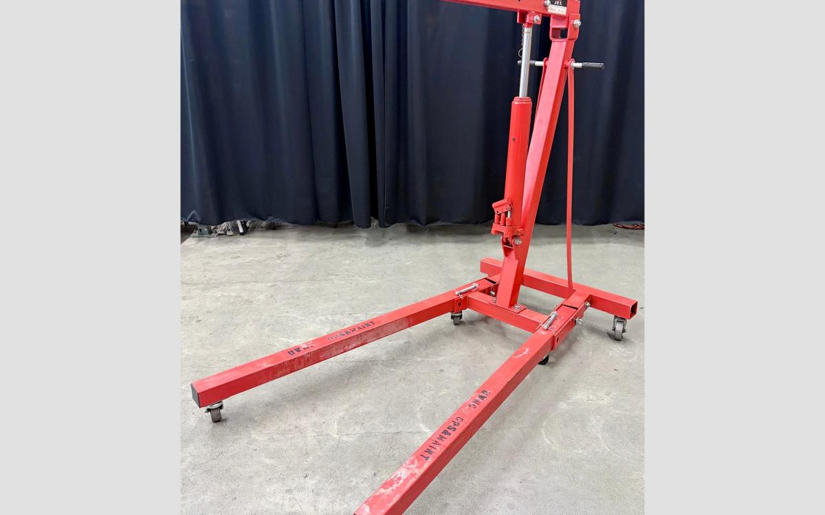 Red engine hoist or shop crane.
