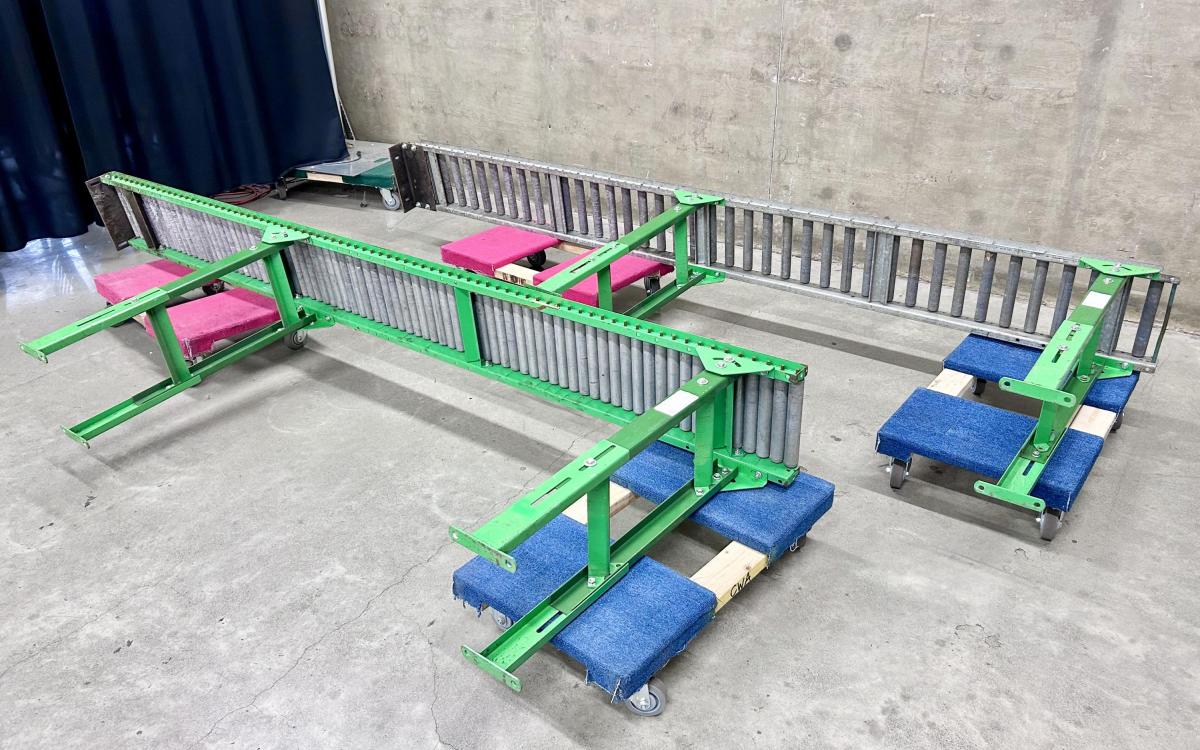 Two 10' outfeed tables on their sides.