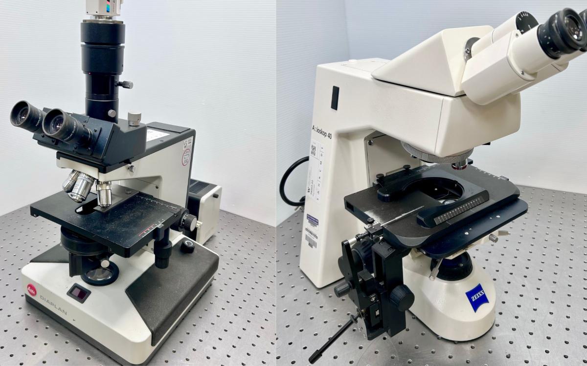 Two microscopes on an optical table.