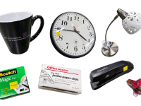 Photos of: coffee much, wall clock, desk lamp, staple remover, stapler, box of paper clips, roll of tape