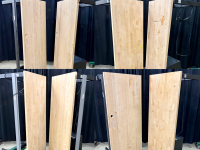 Stiched image of eight butcher block workbenches on their sides.