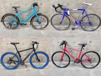 Stitch of four unique bicycles.