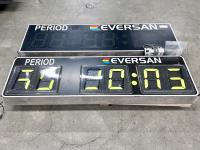 2 sports event score boards on a pallet.