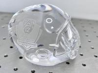 Crystal football helmet etched with "Pac 12 2011 Football Championship" ont he side.
