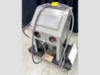 Bench sandblaster unit with Econoline brand visible on it's front.