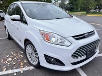 White 2012 Ford C-Max as viewed from the front corner.