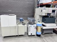 Brother wire EDM with accessories.