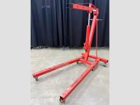 Red engine hoist or shop crane.