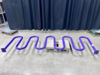 Purple bike rack sideways on a moving dolly.