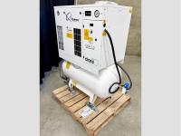 Large white air compressor with an attached tank on a pallet.